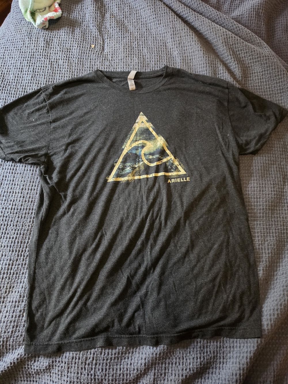 Next Level Apparel Black T-Shirt with Gold Triangle Wave Graphic